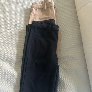 2 pairs of girls chinos.  Blue and tan.  Lightly worn.